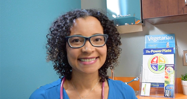 Dr. Yami Cazorla-Lancaster, a vegan pediatrician, in her office
